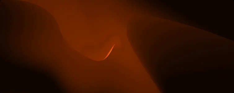 A soft orange glow curving through darkness.