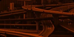 A motorway interchange of stacked curving ramps.